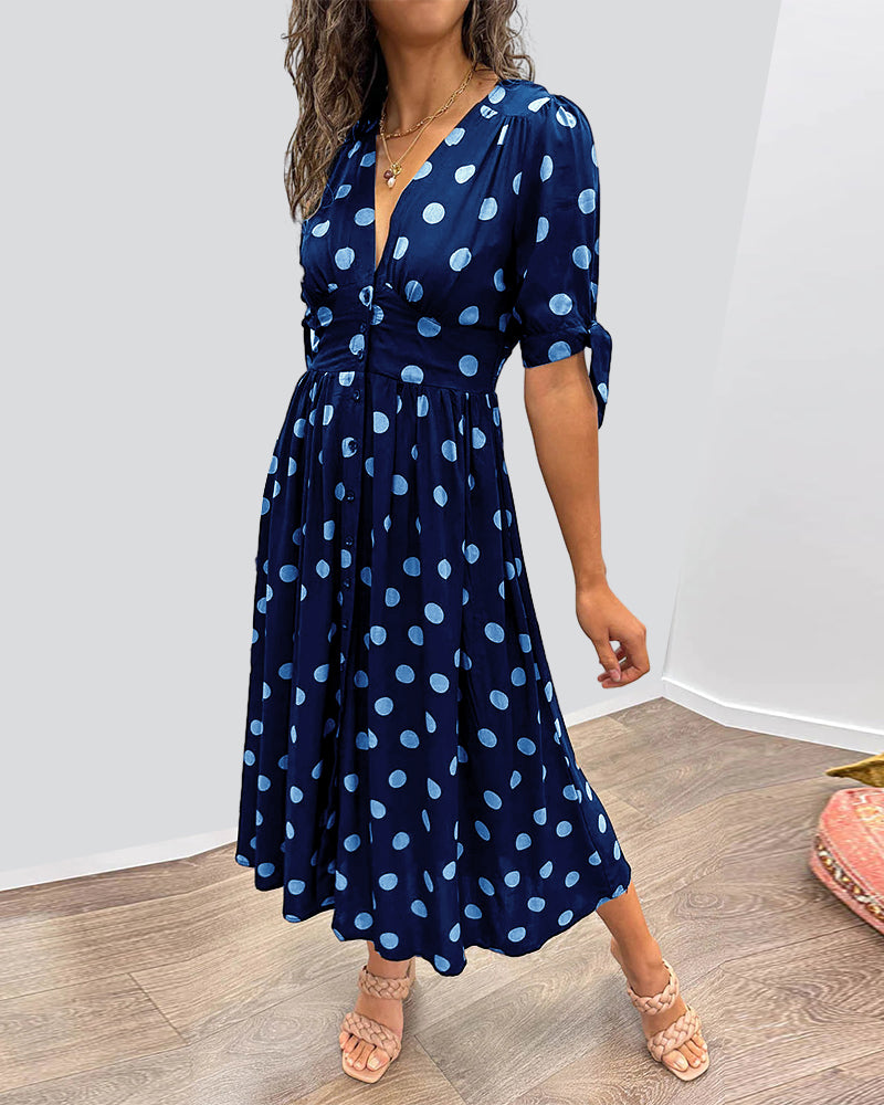 Ragen - Dress with deep V neckline and polka dots