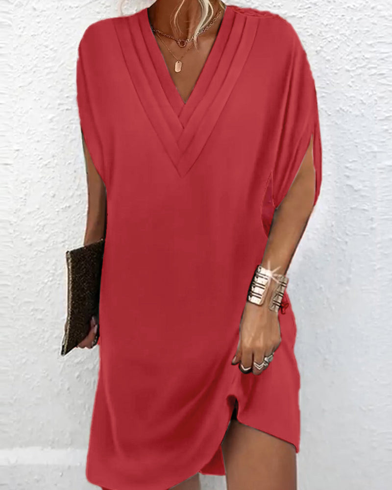 Elegant split-sleeve dress in solid color