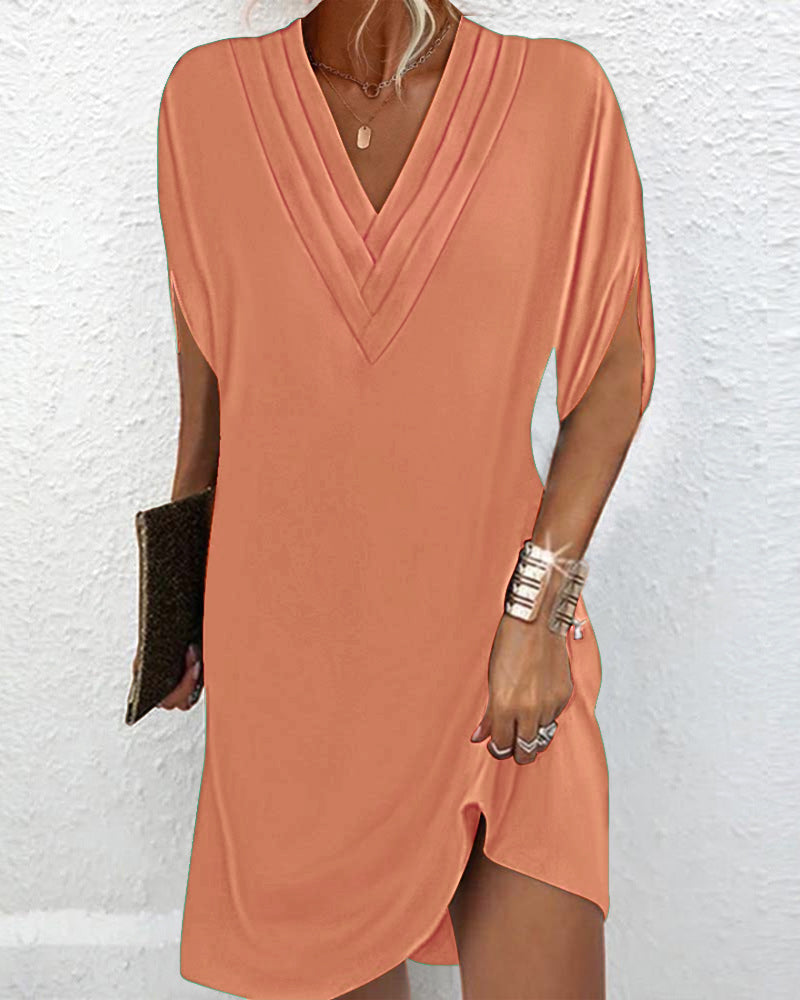 Elegant split-sleeve dress in solid color